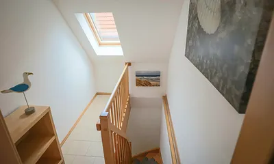 Treppe zur Ferienwohnung Herzmuschel