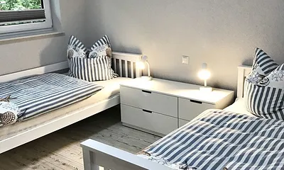 Schlafzimmer mit 2 Einzelbetten