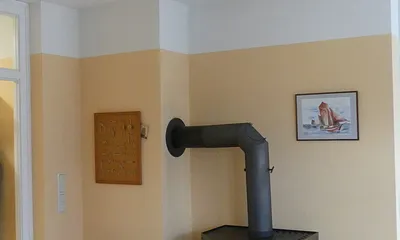 Kaminofen EG-Wohnung; darf aber ab 2025 nicht mehr benutzt werden