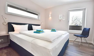 Schlafzimmer 1 mit Doppelbett