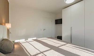 Schlafzimmer mit Kleiderschrank