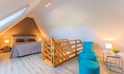 erstes Schlafzimmer mit Doppelbett