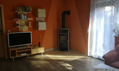 Wohnzimmer mit Kaminofen