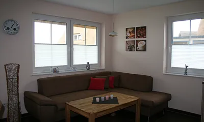 Wohnzimmer mit gemütlicher Eckcouch