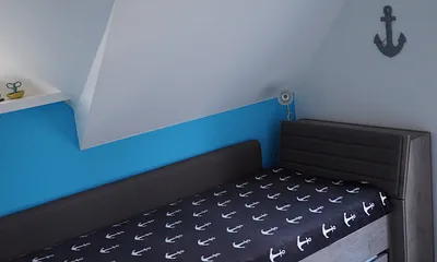 3. Schlafzimmer mit Einzelbett und ausziebarem Rollbatt