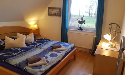 1. Schlafzimmer mit Boddenblick