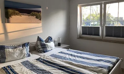 Schlafzimmer 1  mit Dopopelbett und TV 