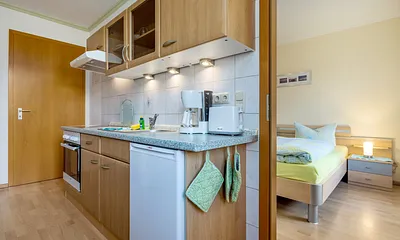 ... Wasserkocher, Toaster und Kaffeemaschine.