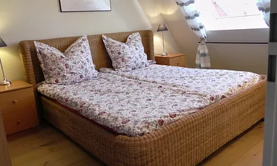 Schlafzimmer 1 / Rattan – Doppelbett