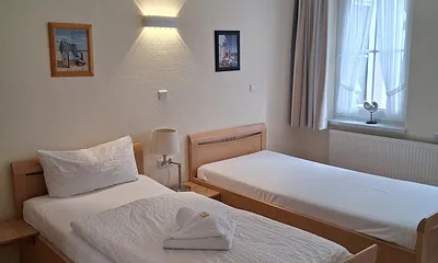 zweites Schlafzimmer mit 2 Einzelbetten