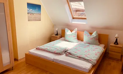 Schlafzimmer mit 2 Doppelbetten 