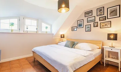 Schlafzimmer 1 - Doppelbett 180x200 mit TV