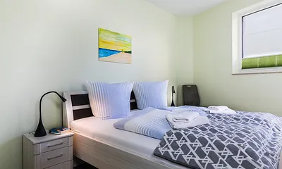 Schlafzimmer 1 mit Doppelbett