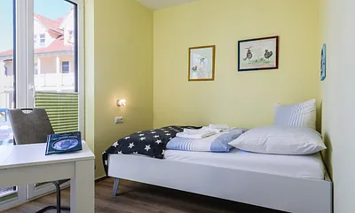 Schlafzimmer 2 mit Doppelbett (1,40 x 2,00)