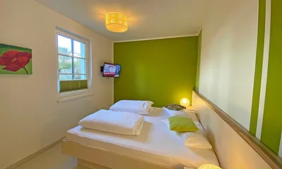 1. Schlafzimmer mit Doppelbett