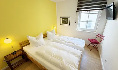 Schlafzimmer mit Doppelbett