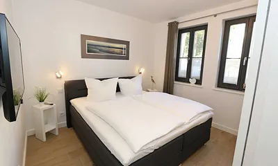 zweites Schlafzimmer mit Boxspringbett