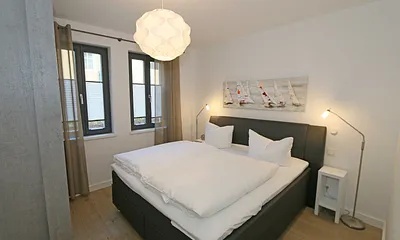Schlaffzimmer mit Doppelbett