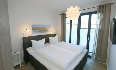 Schlafzimmer mit Doppelbett