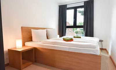 Schlafzimmer mit Doppelbett