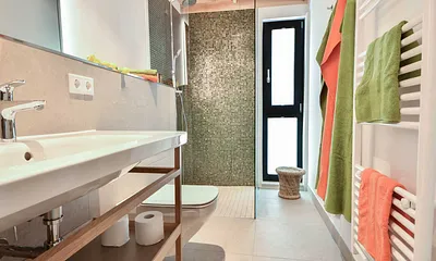 Bad mit bodentiefer Dusche