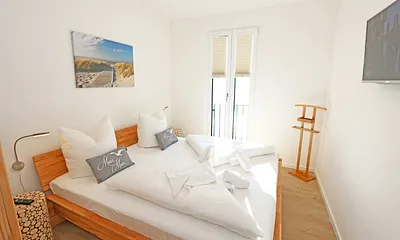Schlafzimmer mit Doppelbett