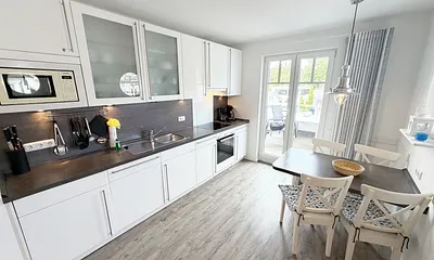 Villa Rosa Whg. 16 Meereszauber - Koch- und Essbereich