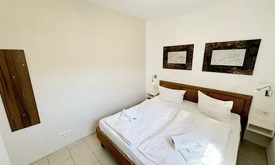 Kurparkresidenz Baabe WE 13 - Doppelbett im Schlafzimmer