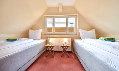 Schlafzimmer mit Einzelbetten