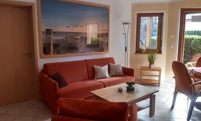 Wohnbereich mit Schlafcouch für 2 Personen