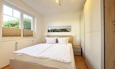 Schlafzimmer mit Doppelbett