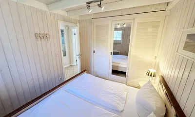 Ferienhaus Sandkörnchen - 1. Schlafzimmer im Erdgeschoss