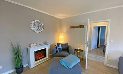 Wohnzimmer mit Elektrokamin