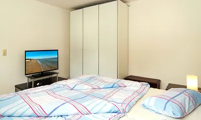 Schlafzimmer mit Doppelbett