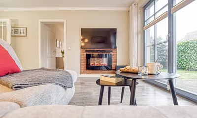 Wohnzimmer mit Elektrokamin