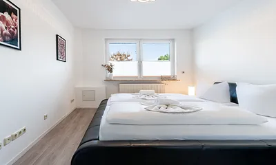 Schlafzimmer mit Doppelbett