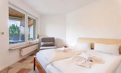 Schlafzimmer mit Schlafsessel