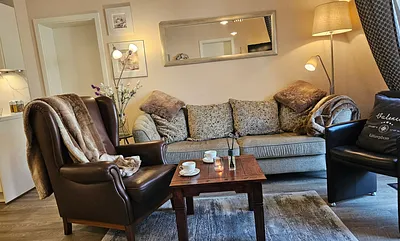 Lederohrensessel lädt zum Verweilen ein