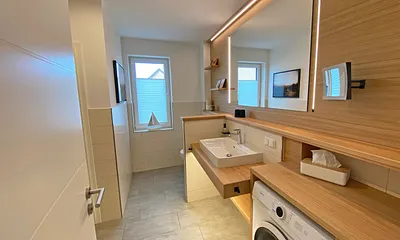 Badezimmer mit Waschmaschine