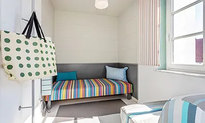 Das zweite Schlafzimmer mit Einzelbett (90x200cm) und Schlafsessel (85x200cm) für die Aufbettung.