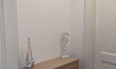 Eingangsbereich mit Schuhschrank und Garderobe