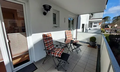 Balkon mit Sitzgelegenheit