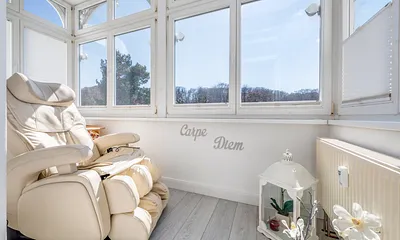 Die sonnige Loggia nach Süden - mit Relaxsessel.