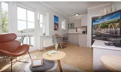 komfortabler Wohnbereich mit einer Schlafcouch (Aufbettungsmöglichkeit 1,40 m x 1,90 m), Couchtisch, Stehlampe sowie einer Kommode mit Flachbild-TV