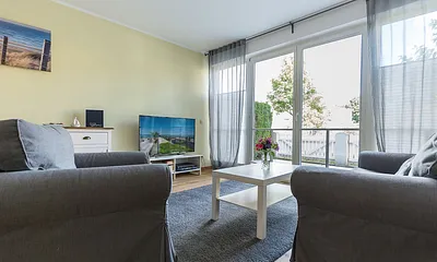 Der Wohnbereich mit Zugang zur West-Terrasse