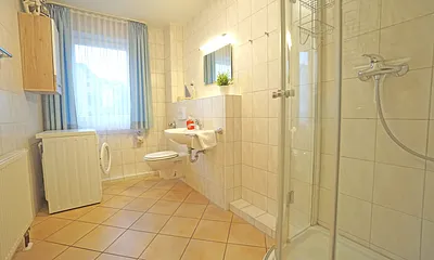 Duschbad mit Waschmaschine