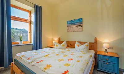 Wohnung 1 - Schlafzimmer