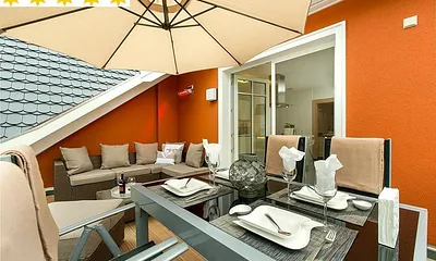 Dachterrasse, die Loungeecke kann an kühlen Tagen beheizt werden (Strom incl.)