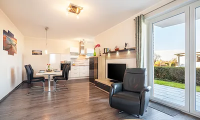 Wohnraum mit Essbereich und Küche