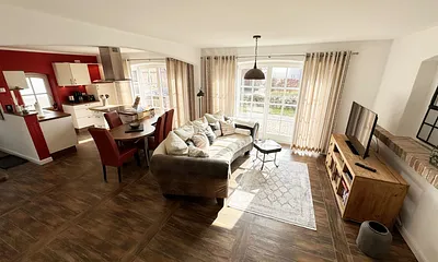 Blick von der Treppe in den Wohnbereich